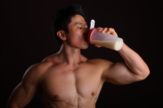 Trainer Enjoying Proteus Nutrition Protein Shake